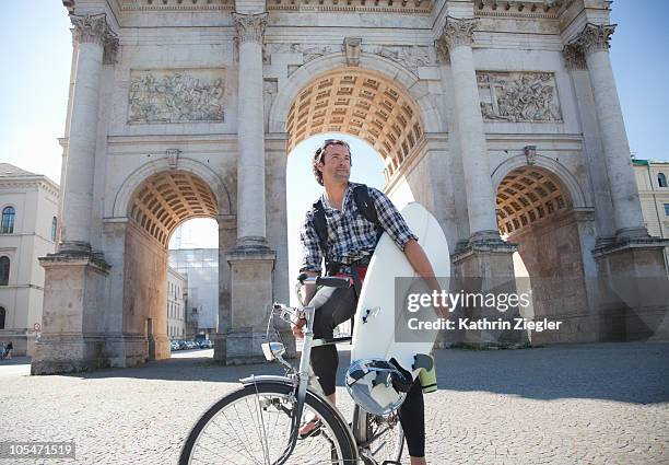 surfing in the city - bavaria bike stock pictures, royalty-free photos & images