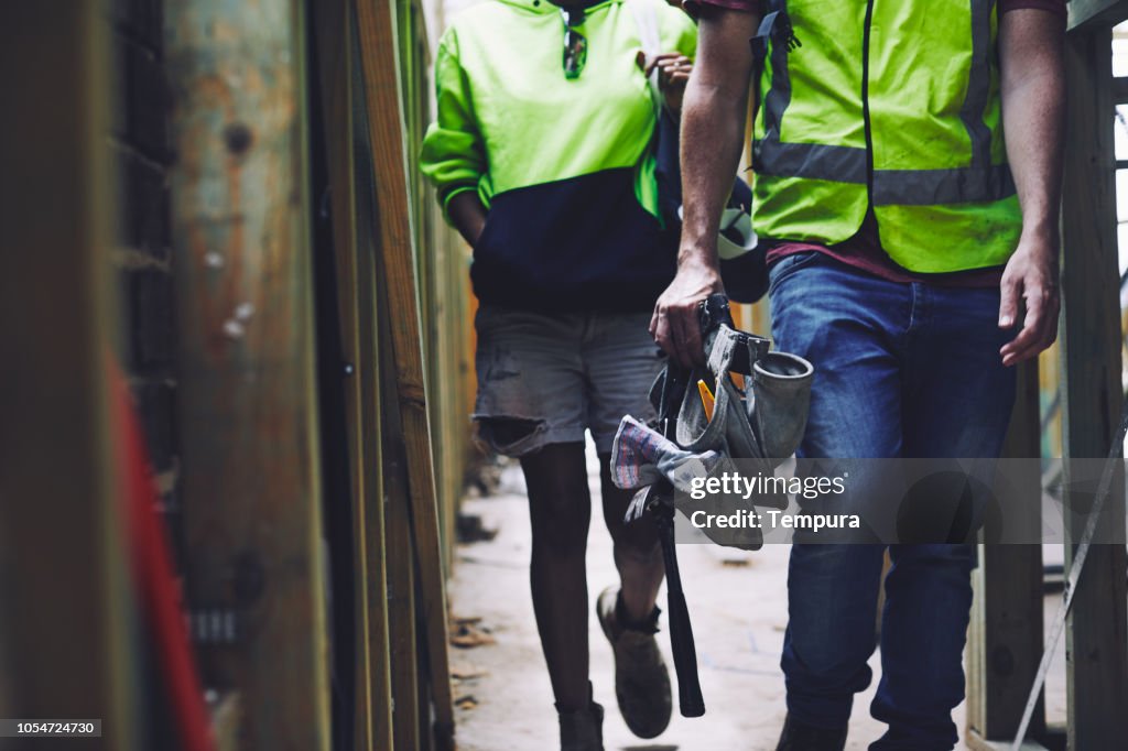 Construction industry worker arriving at work.