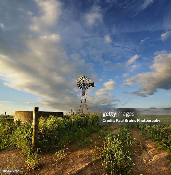 sunset wind pump - durbanville stock pictures, royalty-free photos & images