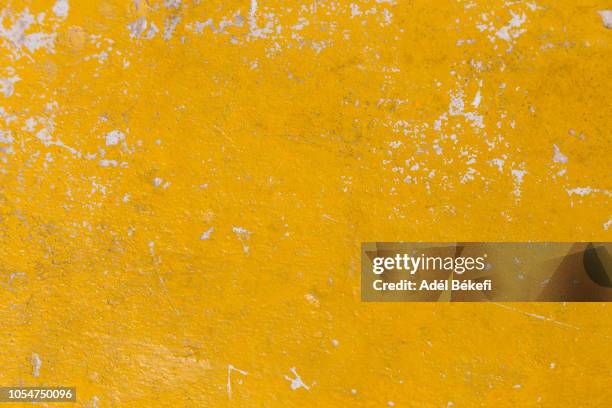 yellow background - weathered ストックフォトと画像