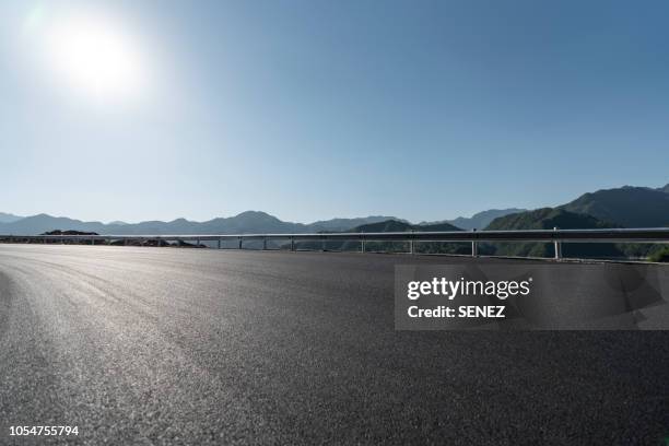 road background - crash barrier stock pictures, royalty-free photos & images