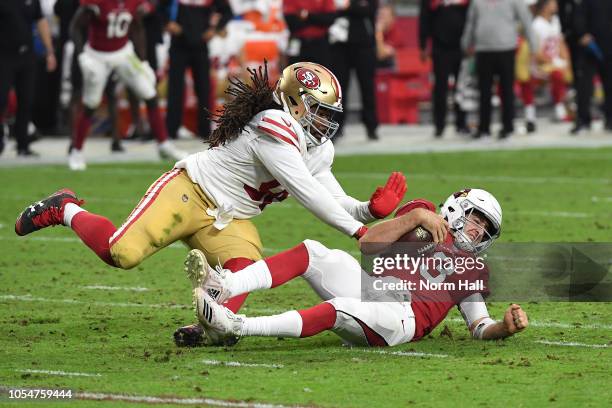 Defensive tackle Sheldon Day of the San Francisco 49ers tackles quarterback Josh Rosen of the Arizona Cardinals during the third quarter at State...