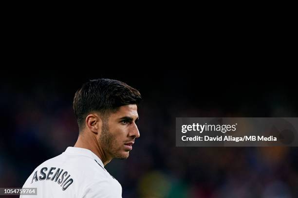 Marco Asensio of Real Madrid CF looks on during the La Liga match between FC Barcelona and Real Madrid CF at Camp Nou on October 28, 2018 in...