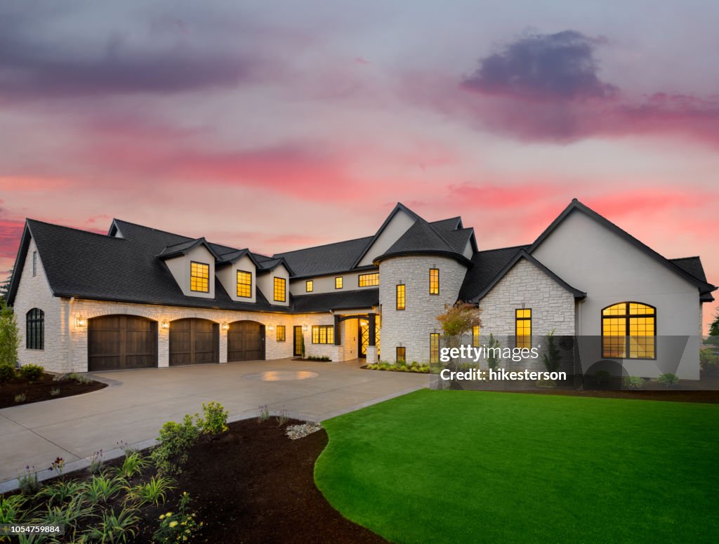 Beautiful luxury home exterior at sunset