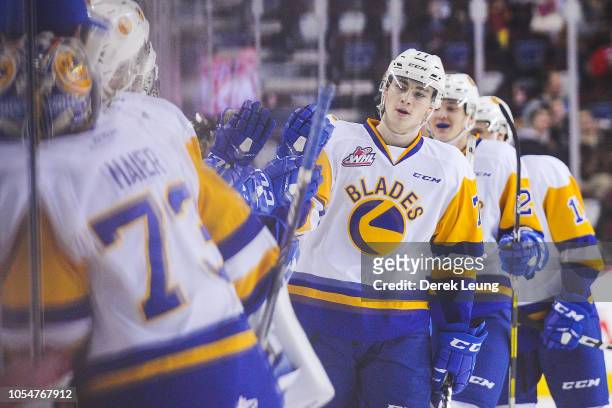 Kirby Dach of the Saskatoon Blades celebrates with the bench after scoring against the Calgary Hitmen during a WHL game at the Scotiabank Saddledome...