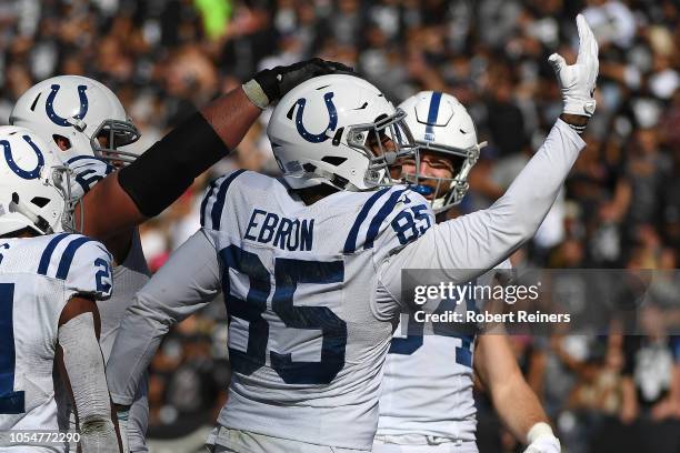 Eric Ebron of the Indianapolis Colts celebrates after a 20-yard touchdown catch against the Oakland Raiders during their NFL game at Oakland-Alameda...