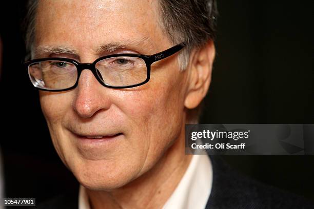 John W. Henry, the owner of New England Sports Ventures, delivers a statement in the offices of the law firm Slaughter and May to announce his...