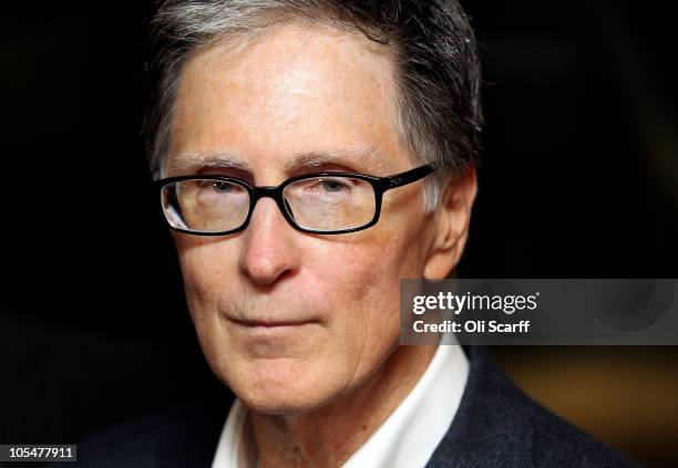 John W. Henry, the owner of New England Sports Ventures, delivers a statement in the offices of the law firm Slaughter and May to announce his...