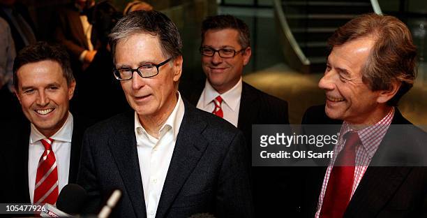 John W. Henry , the owner of New England Sports Ventures, delivers a statement in the offices of the law firm Slaughter and May to announce his...