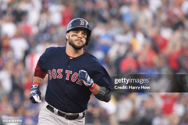 Steve Pearce of the Boston Red Sox celebrates his first inning two-run home run against the Los Angeles Dodgers in Game Five of the 2018 World Series...