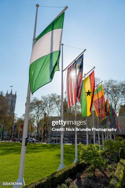 commonwealth flags, parliament square, westminster, london. - south africa v italy stock pictures, royalty-free photos & images