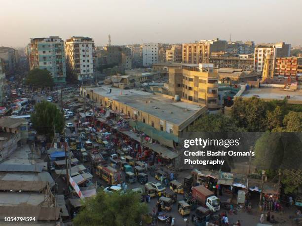 karachi -life going around streets of the city - pakistan skyline stock pictures, royalty-free photos & images