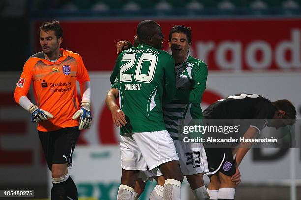 Bernd Nehrig of Fuerth celebrates scoring the 3rd team goal with his team mates Kingsley Onuegbu and Danjiel Aleksic , whilst Tino Berbig , keeper of...