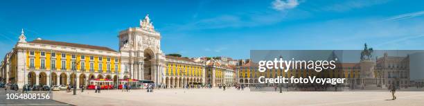 lisbon rua augusta arch overlooking praca do comercio square panorama portugal - baixa stock pictures, royalty-free photos & images