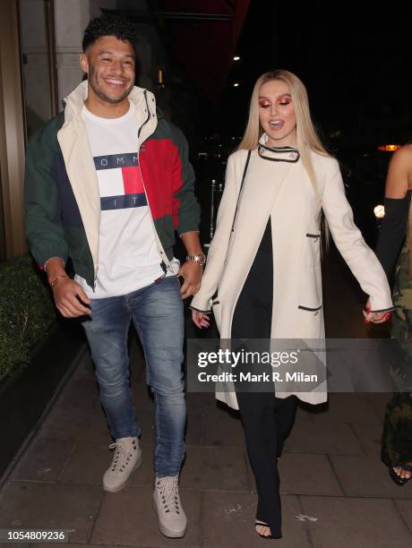 Perrie Edwards and Alex Oxlade Chamberlain leaving Novikov restaurant on October 28, 2018 in London, England.