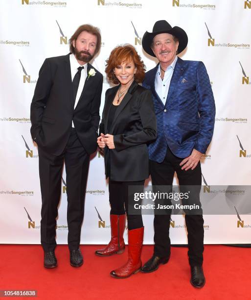 Country artist's Ronnie Dunn, Reba McEntire and Kix Brooks attend the 2018 Nashville Songwriters Hall Of Fame Gala at Music City Center on October...