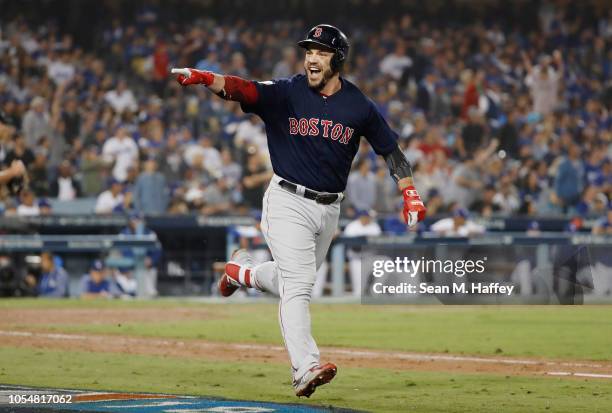 Steve Pearce of the Boston Red Sox celebrates his eighth inning home run against the Los Angeles Dodgers in Game Five of the 2018 World Series at...