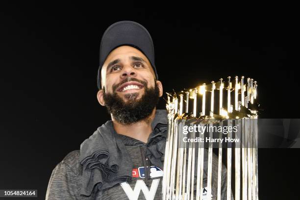 David Price of the Boston Red Sox celebrates with the World Series trophy after his team's 5-1 win over the Los Angeles Dodgers in Game Five to win...