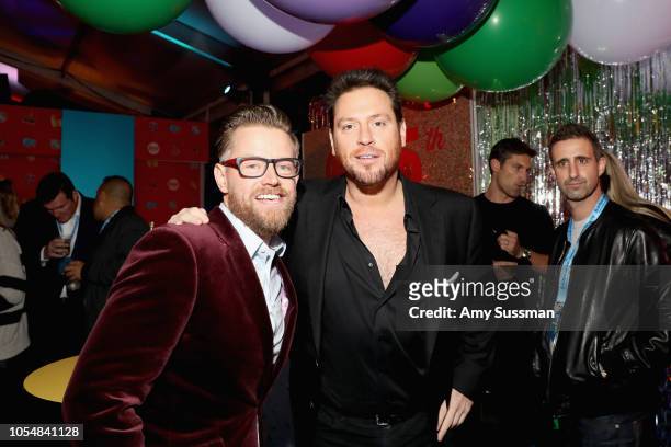 Richard Blais and Scott Conant attend Food Network's 25th Birthday Party Celebration at the 11th annual New York City Wine & Food Festival at Pier 92...