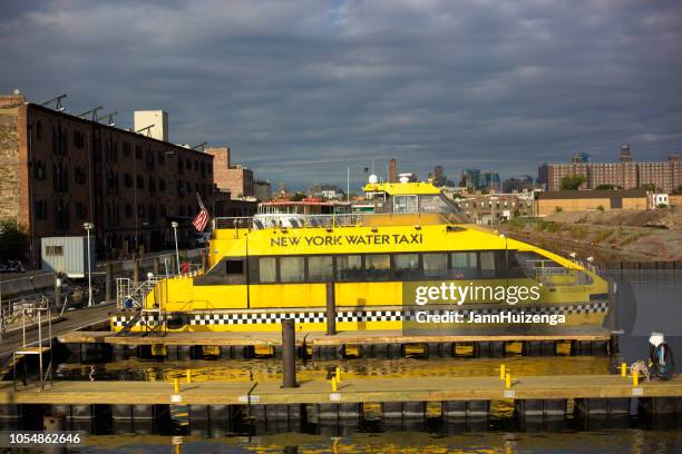 red hook, brooklyn, ny: sunlit new york water taxi - ferry terminal stock pictures, royalty-free photos & images