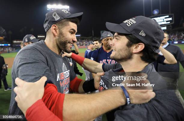 Martinez and MAndrew Benintendi of the Boston Red Sox celebrate their teams 5-1 win over the Los Angeles Dodgers in Game Five of the 2018 World...