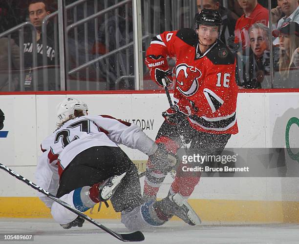 Jacob Josefson of the New Jersey Devils skates in his first shift of his first NHL game against Kyle Quincey of the Colorado Avalanche at the...