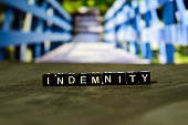Indemnity on wooden blocks