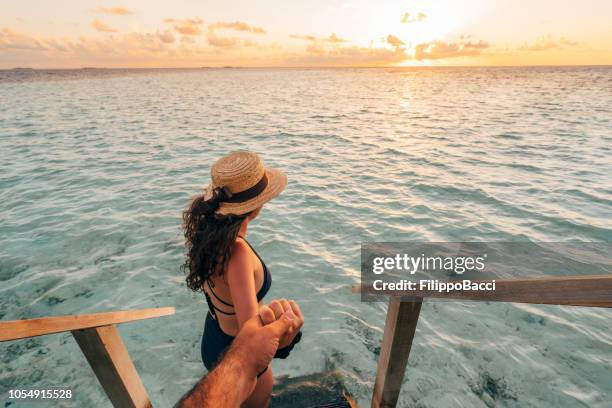 follow me to the sea at sunset - maldives beach stock pictures, royalty-free photos & images