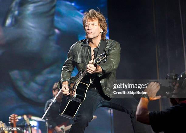 Musician Jon Bon Jovi of Bon Jovi performs on the beach during a benefit concert on October 15, 2010 in Gulf Shores, Alabama.