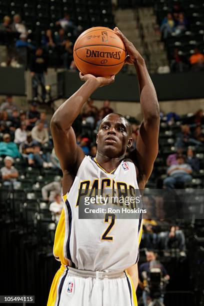 Darren Collison of the Indiana Pacers shoots a free throw against the New Orleans Hornets on October 15, 2010 at Conseco Fieldhouse in Indianapolis,...