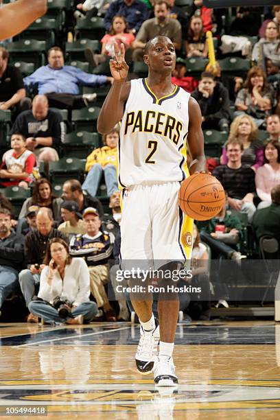 Darren Collison of the Indiana Pacers brings the ball up court on the New Orleans Hornets on October 15, 2010 at Conseco Fieldhouse in Indianapolis,...