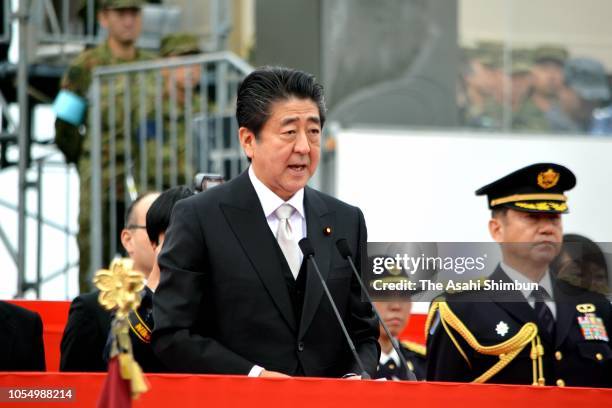 Japanese Prime Minister Shinzo Abe addresses during the Japan's Ground Self-Defense Force annual review at the Japan Ground Self Defense Force Camp...