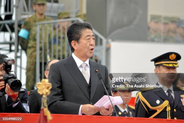 Japanese Prime Minister Shinzo Abe addresses during the Japan's Ground Self-Defense Force annual review at the Japan Ground Self Defense Force Camp...