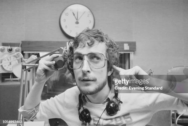 English broadcaster and disc jockey Steve Wright in a radio studio, UK, 29th November 1979.