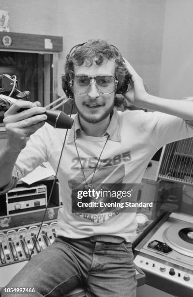 English broadcaster and disc jockey Steve Wright in a radio studio, UK, 29th November 1979.