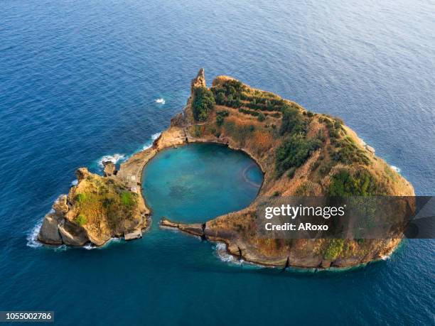 bird eye view in azores, aerial panoramic view of  slet of vila franca do campo is formed by the crater of an old underwater volcano - san miguel portugal stockfoto's en -beelden