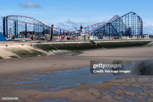 The 'Big One' roller coaster seen from the pier, Blackpool Pleasure Beach, Blackpool, Lancashire, England. Artist Ethel Davies.