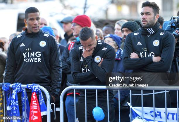 Leicester City players Danny Simpson and Vicente Iborra pay their respects at the sea of tributes to the victims of the crash at Leicester City...
