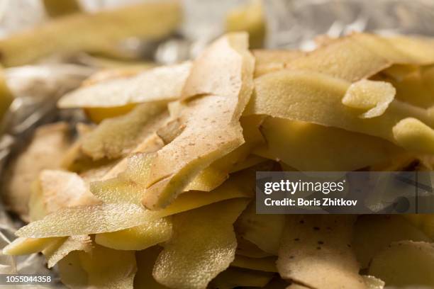 potato peels. - peeling food stock pictures, royalty-free photos & images