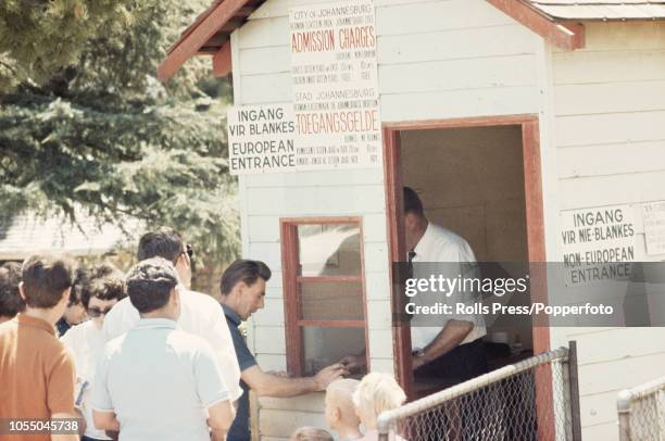 View of white visitors queuing to buy tickets for Johannesburg zoo at a dedicated European ticket office entrance in Johannesburg during the...