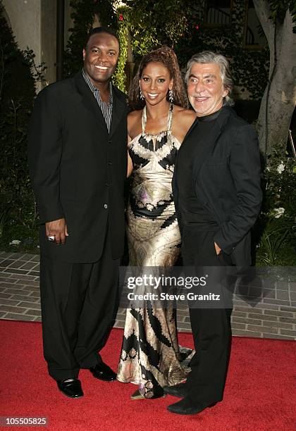 Rodney Peete, Holly Robinson Peete and Roberto Cavalli