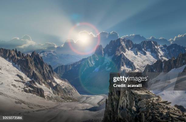 couple of climbers reaching a mountain top - courmayeur stock pictures, royalty-free photos & images