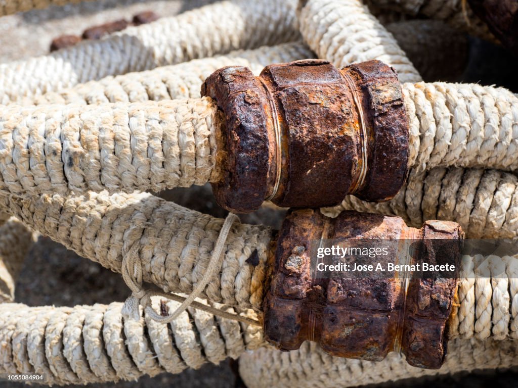 Rusty Rope Closeup Of Heap Of Thick Ropes With Metallic Rusty Unions To Tie Ships ...