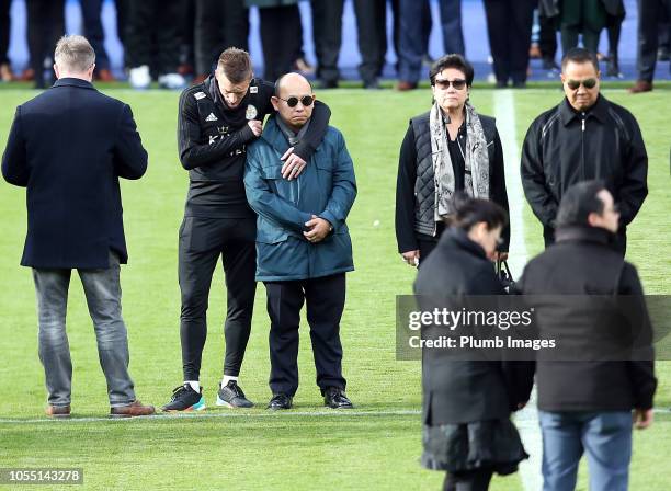 Leicester City vice chairman Aiyawatt "Top" Srivaddhanaprabha and mother Aimon Srivaddhanaprabha lay a wreath during a minute's silence held by...