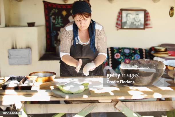 making bread in traditional way - romania stock pictures, royalty-free photos & images