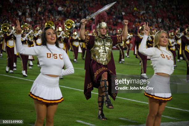 Trojans marching band, Tommy Trojan and cheerleaders at Los Angeles Memorial Coliseum on October 13, 2018 in Los Angeles, California.