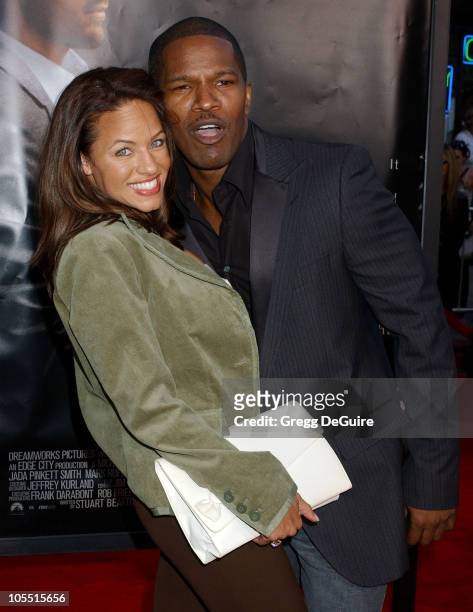 Jamie Foxx and Leila Arcieri during "Collateral" Los Angeles Premiere - Arrivals at Orpheum Theatre in Los Angeles, California, United States.