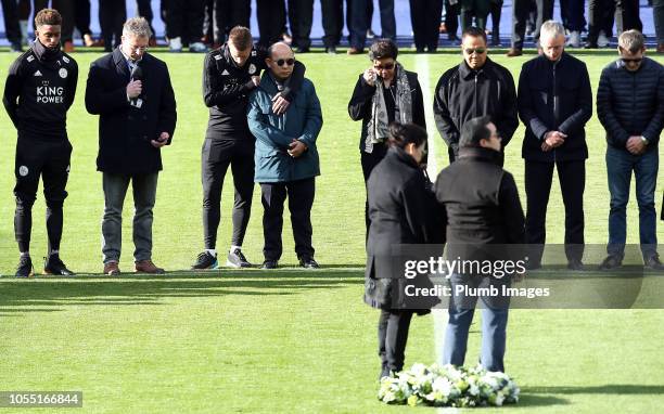 Leicester City vice chairman Aiyawatt "Top" Srivaddhanaprabha and mother Aimon Srivaddhanaprabha lay a wreath during a minute's silence held by...