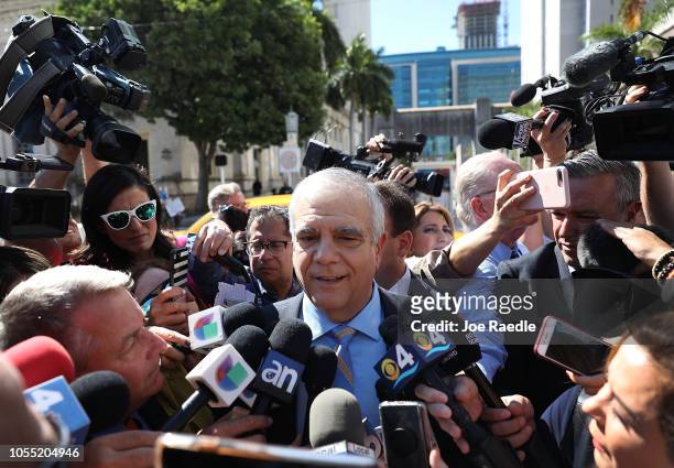Daniel Aaronson, from the Benjamin, Aaronson, Edinger & Patanzo P.A. Law firm, speaks to the media outside the Federal District court for the...