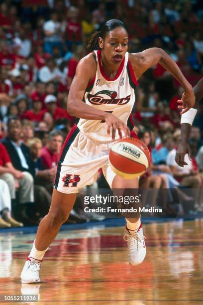 Tina Thompson of the Houston Comets dribbles during Game Two of the 2000 WNBA Finals on August 26, 2000 at the Compaq Center in Houston, Texas. NOTE...